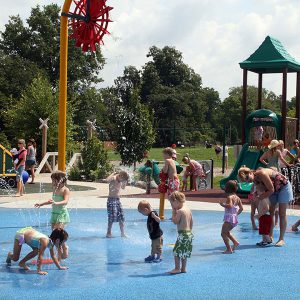 Wide view of the Beech Acres Park all-children's playground and water play area