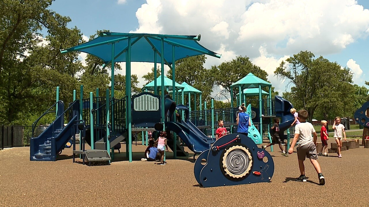 Wide view of the Boone Woods Park accessible playground