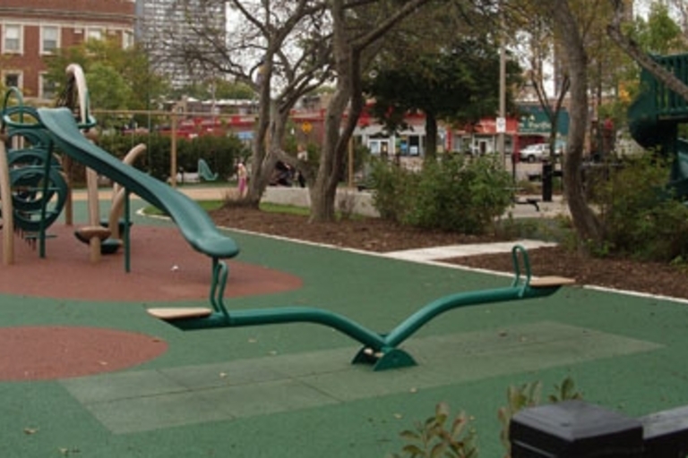 Seesaw and climbing dome at Charles Bromann Park playground.