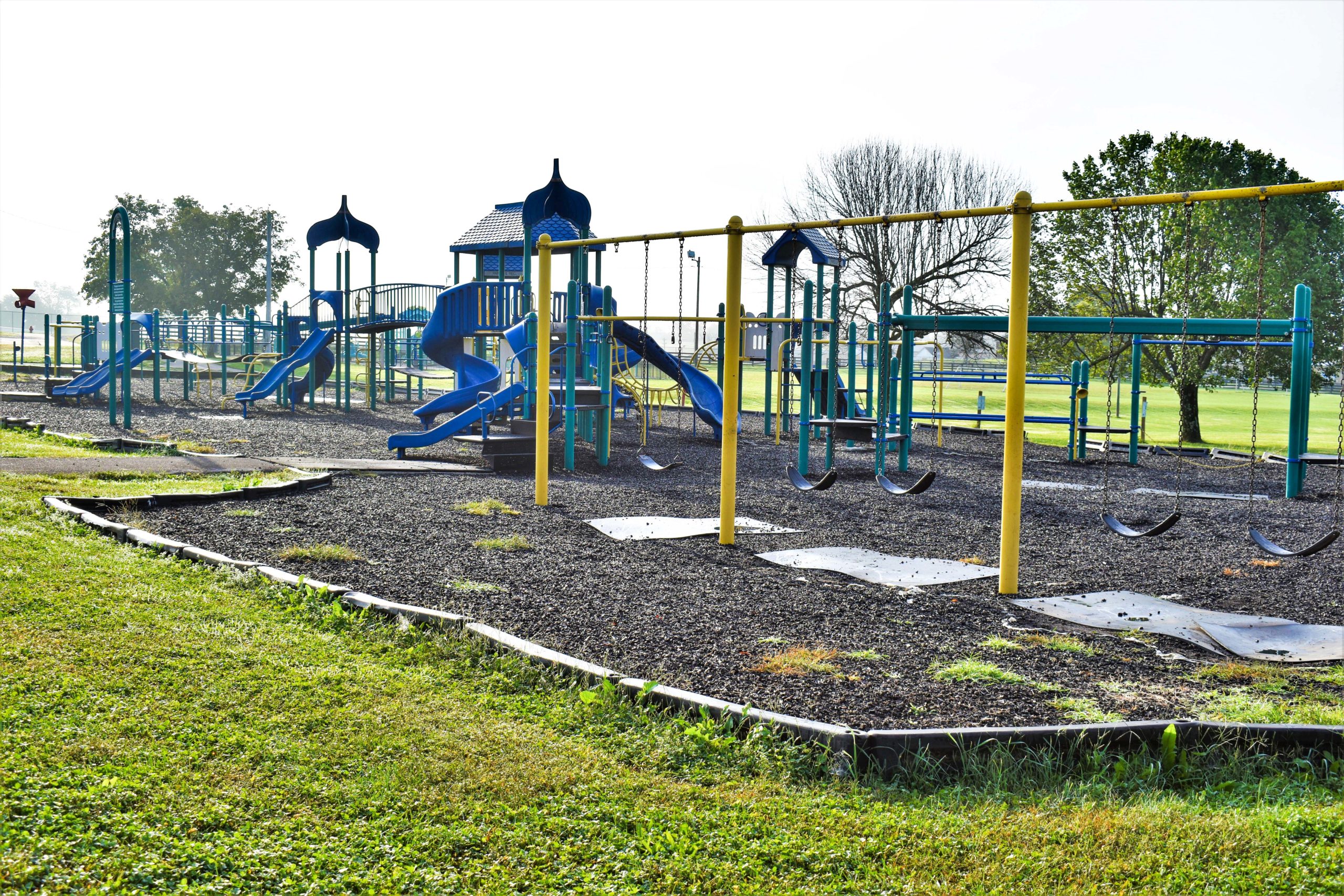 Park playground equipment and open area at City County Park
