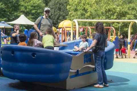 Colorful accessible play structures and surfacing at Clemyjontri Park