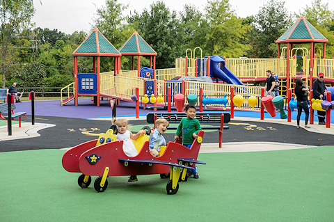 Transportation-themed accessible play zone at Clemyjontri Park