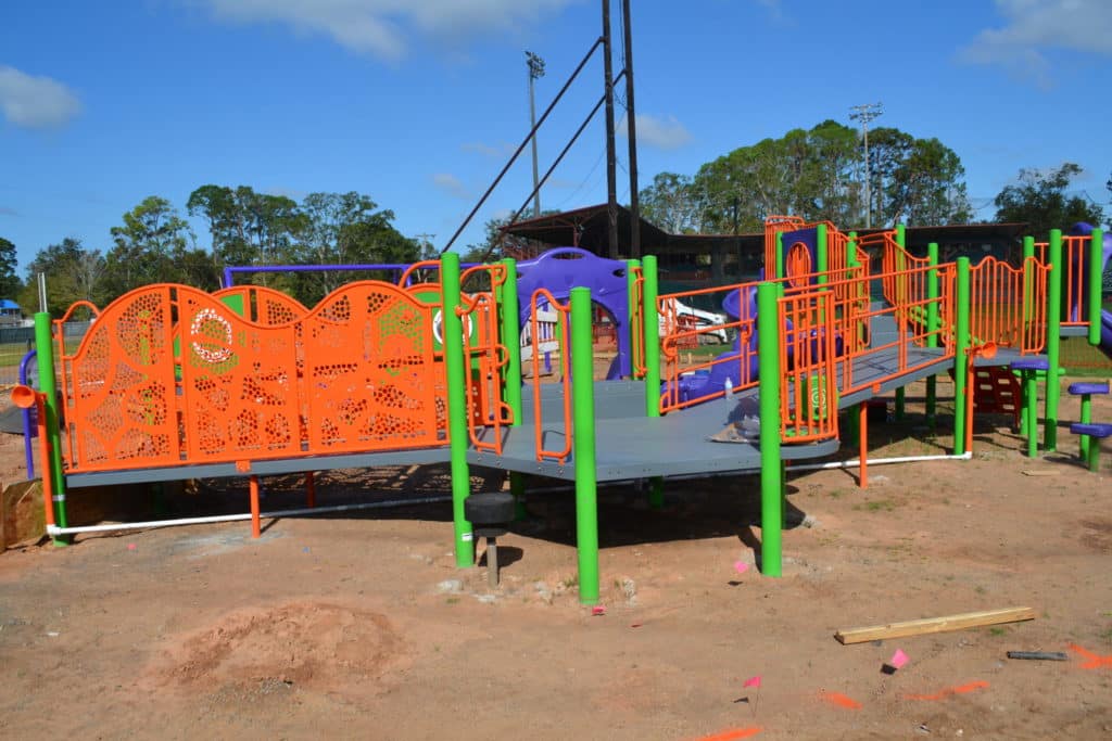 Play structures and surfacing at Coughlin Saunders Inclusive Playground in Alexandria