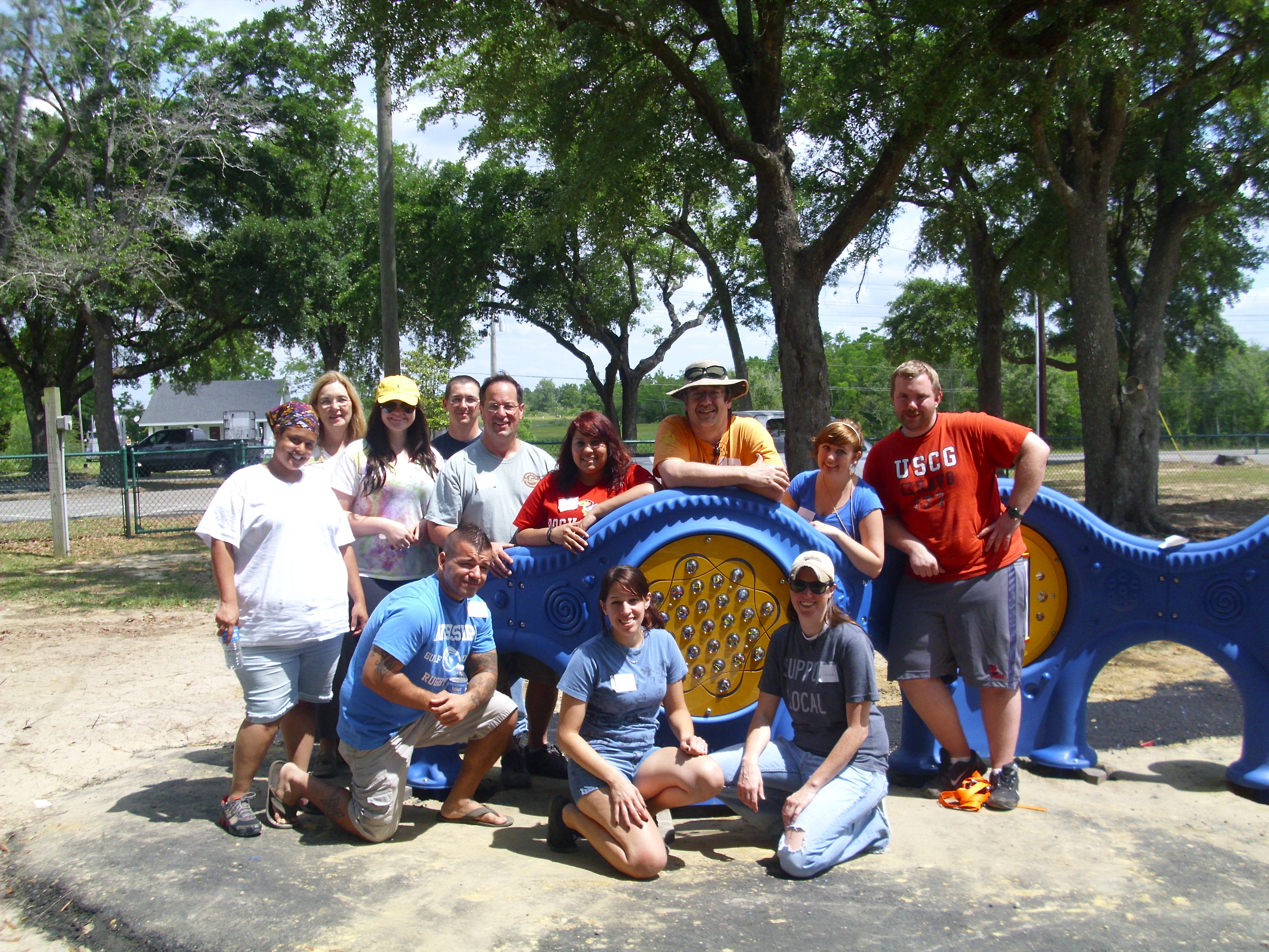 Volunteers helping with the community playground project