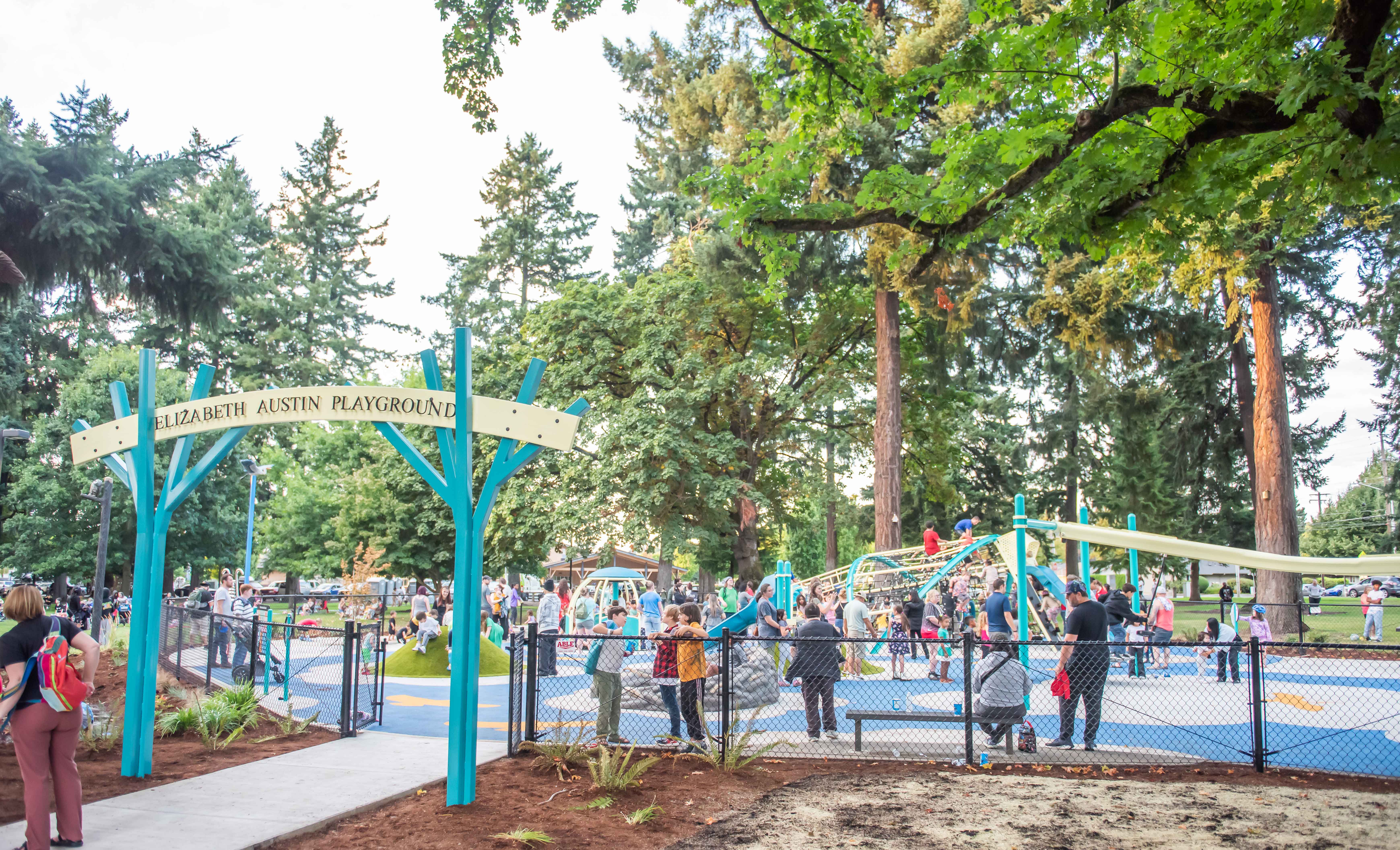 Fenced inclusive playground at Fruit Valley Park