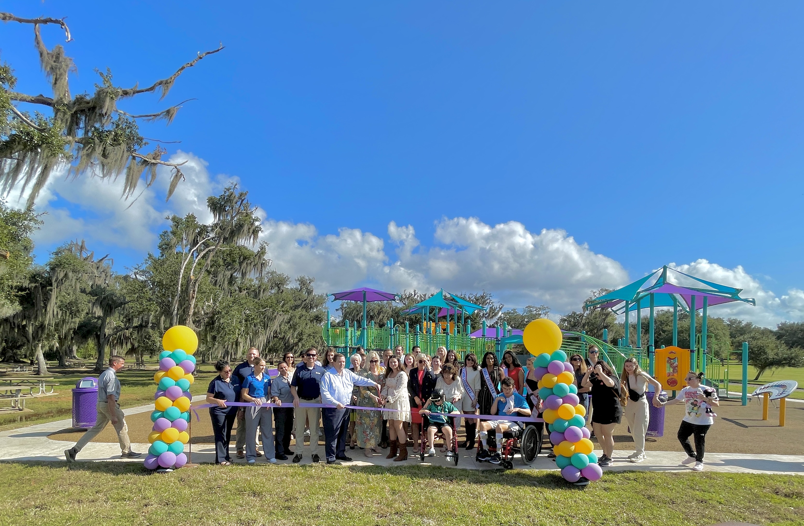 Opening-day photo at Fontainebleau State Park's all-inclusive playground