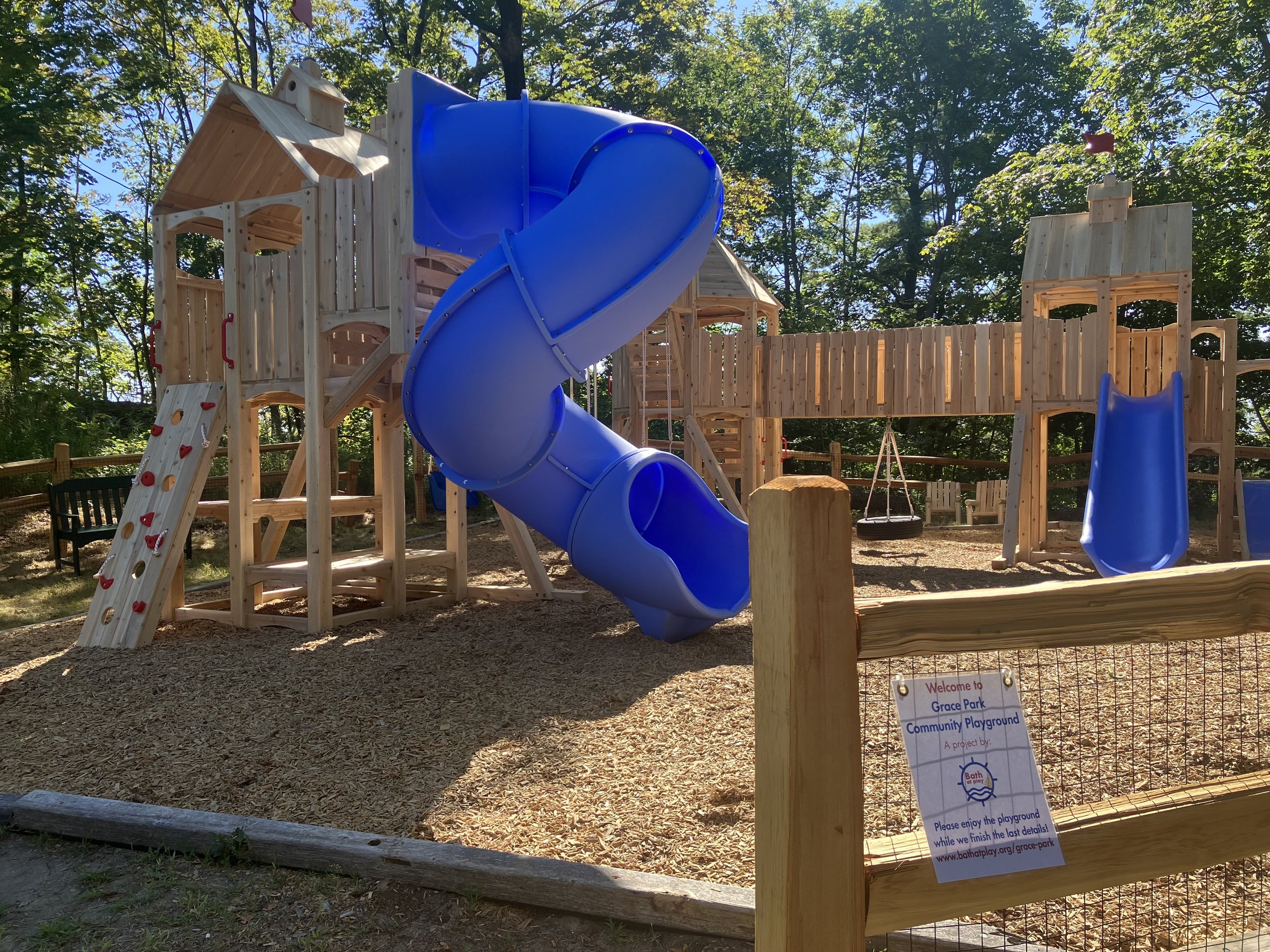 Front view of Grace Park Community Playground play structures