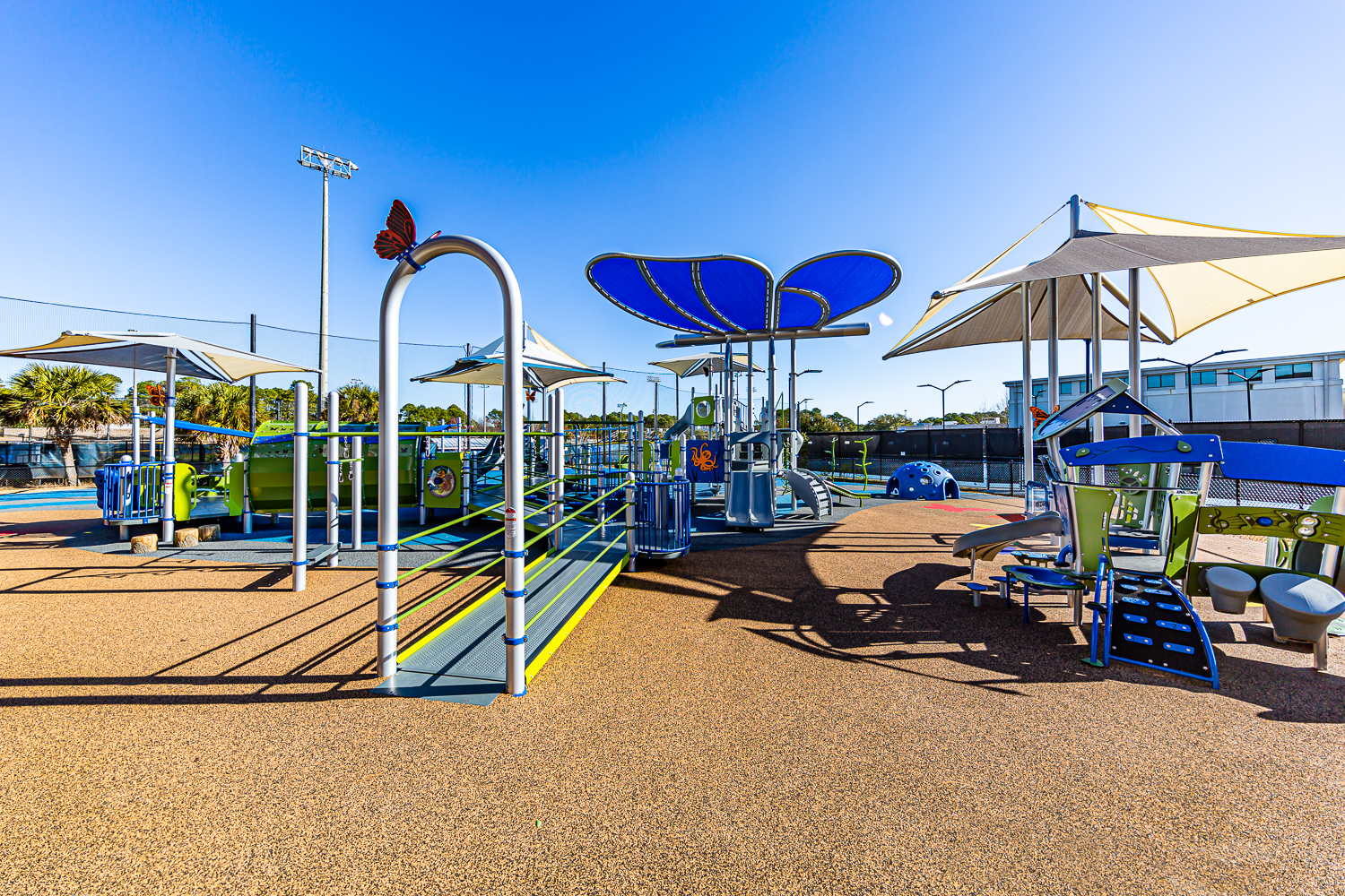 Inclusive spinner and surrounding accessible surfacing