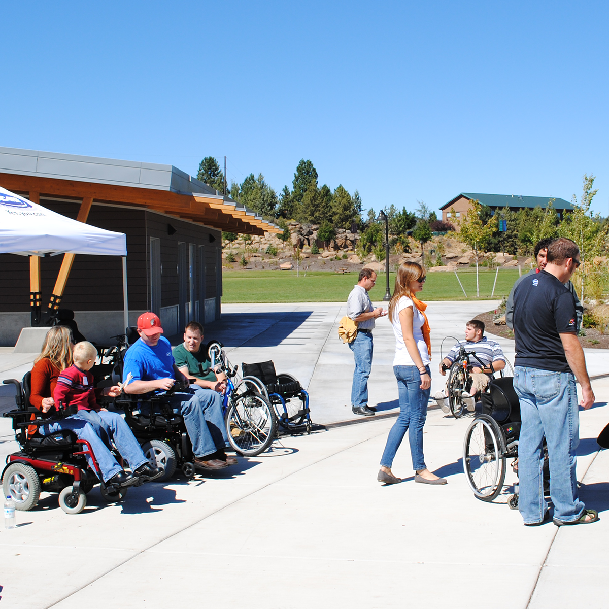 Group of wheelchair users outdoors in Bend Parks accessibility image