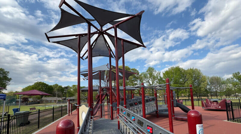 Wide view of the inclusive playground at Latimer Lakes Park