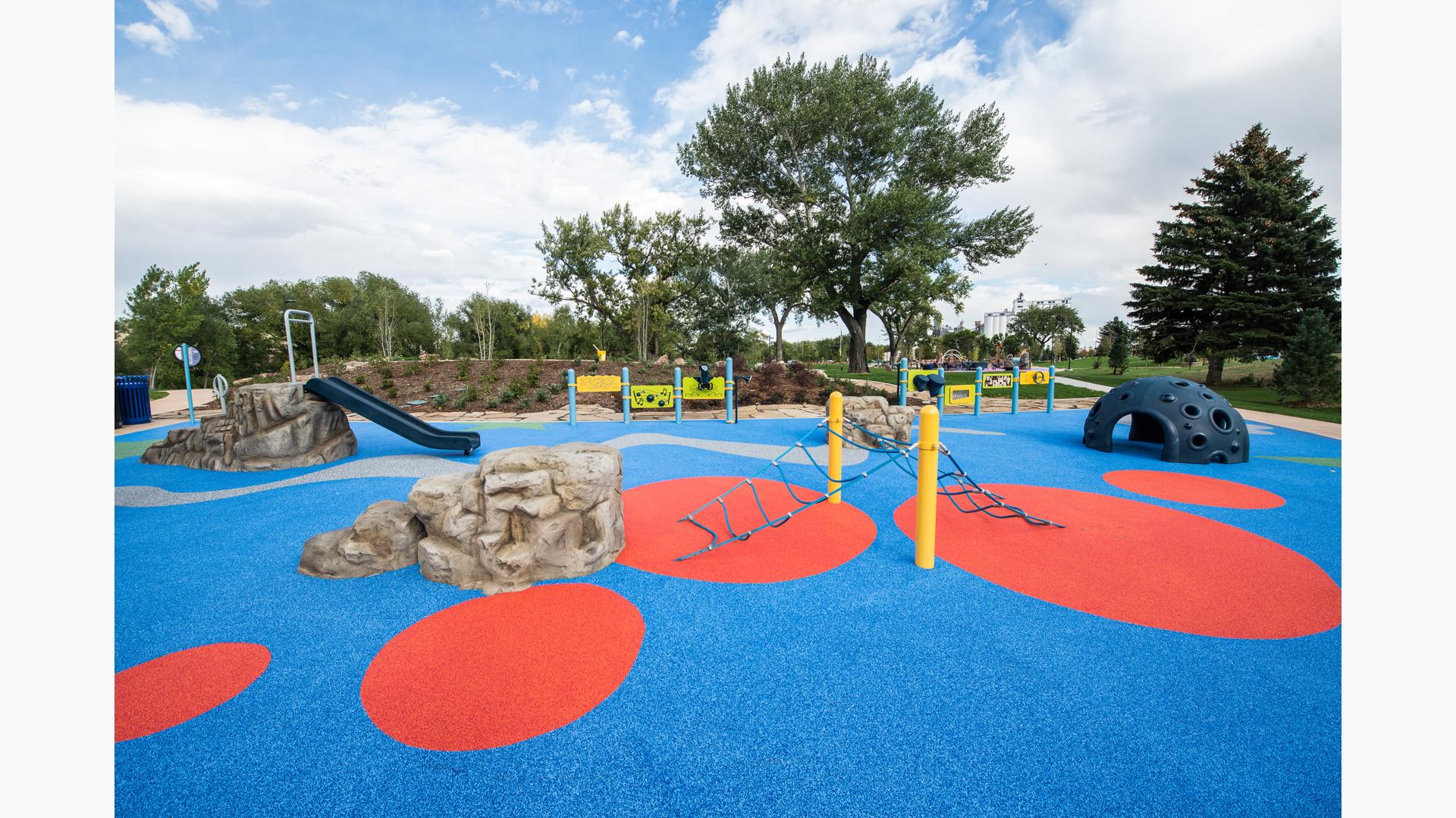 Accessible play features and surfacing at Legacy Commons