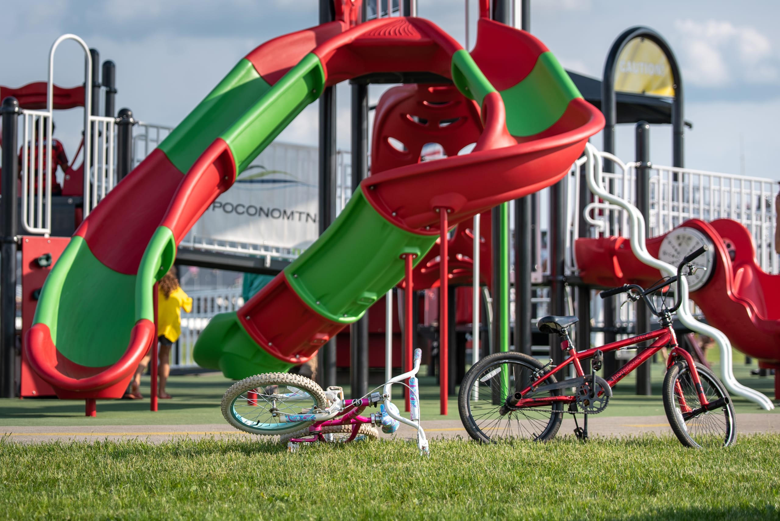 Inclusive playground structures and children at Pocono Raceway