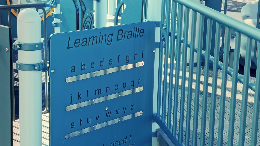 Braille alphabet sign at Lions Park
