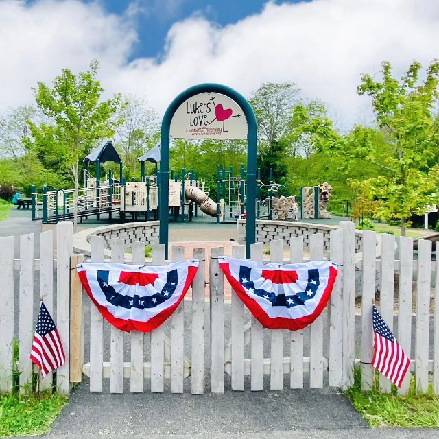 Front entrance with flags at Luke's Love Boundless Playground