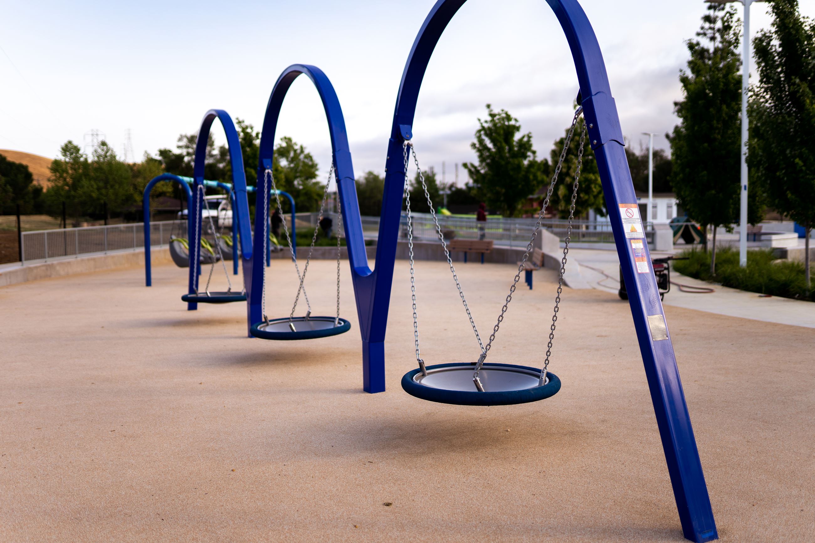 Swings at Magical Bridge Playground in Morgan Hill