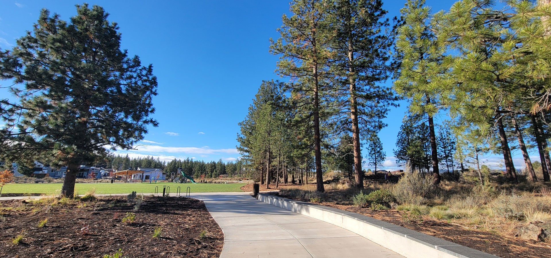 Paved path and lawn at Manzanita Ridge Park
