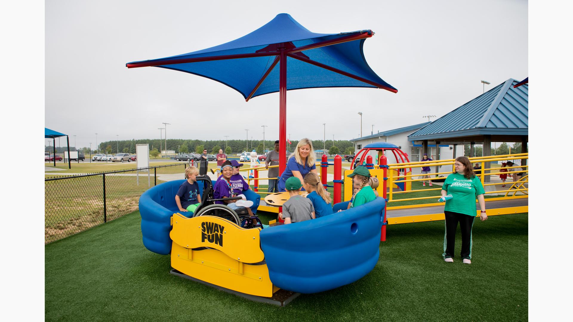 Adaptive and sensory play features at the Monticello Miracle League playground