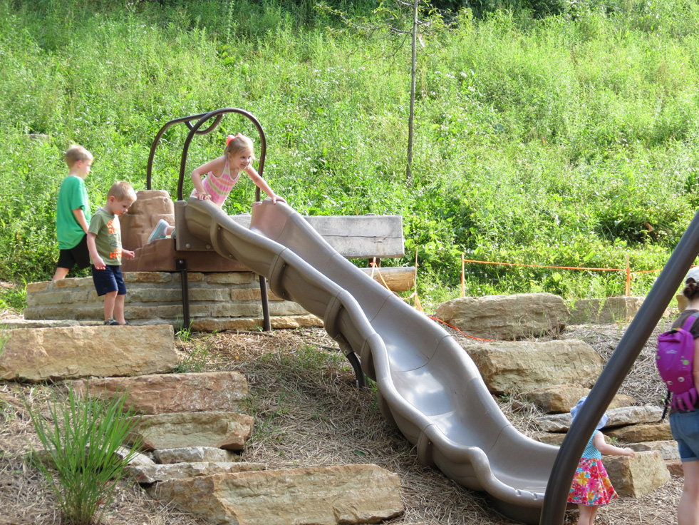 Natural climbing and imaginative play elements at NaturePlay@BCM