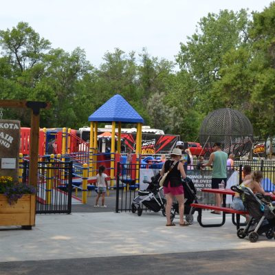 Ground-level and sensory-oriented play features at the state fairgrounds playground