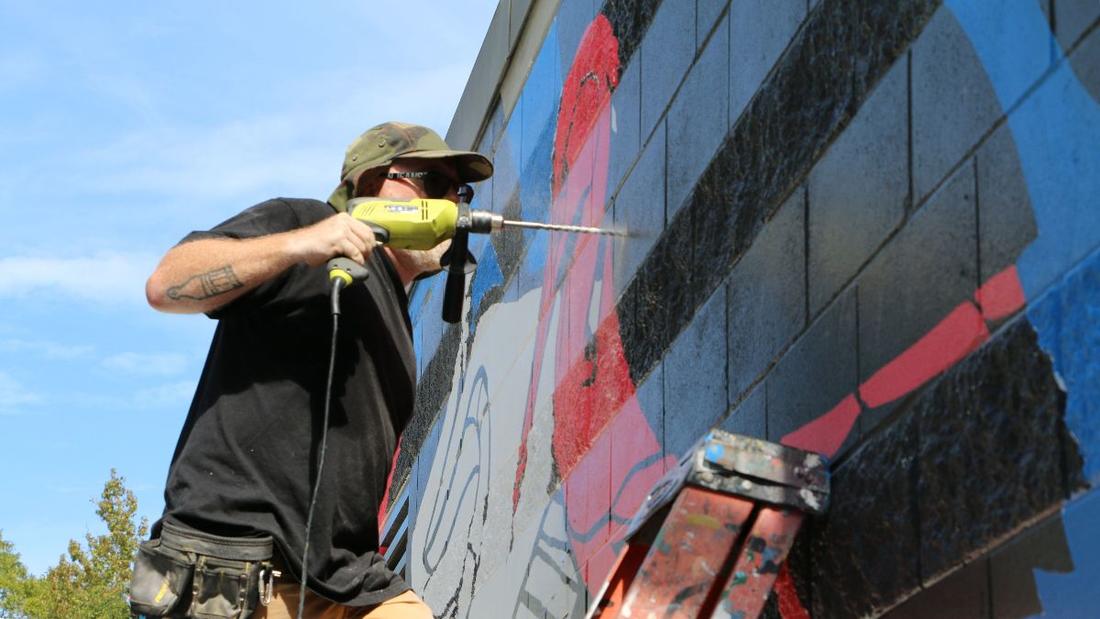 Public art mural at New Tampa All-Abilities Playground