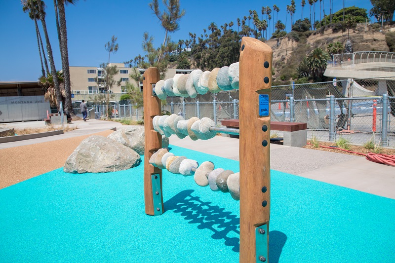 Families at North Beach Playground by the beach