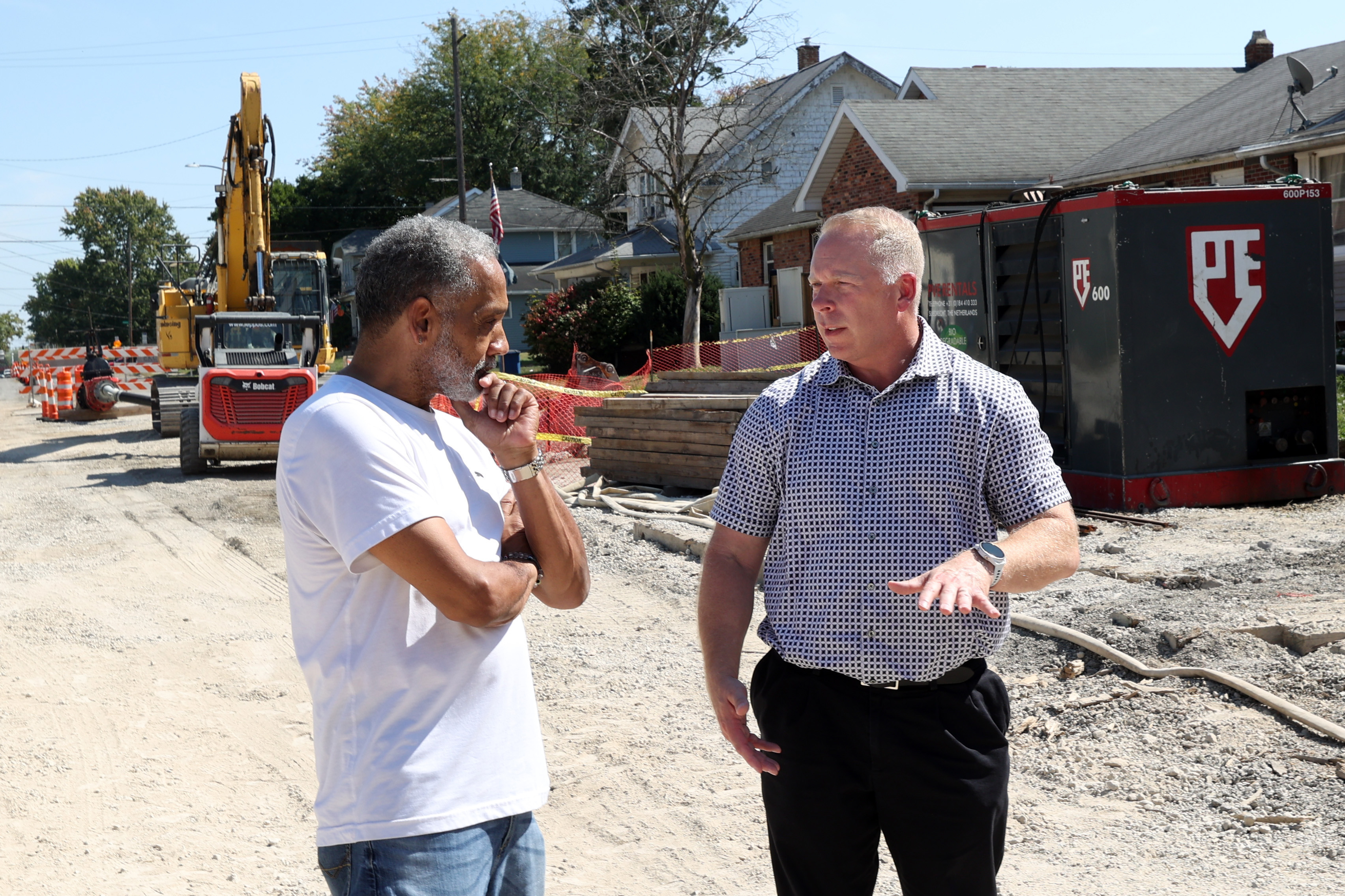 Families using accessible play equipment at Ottawa Park