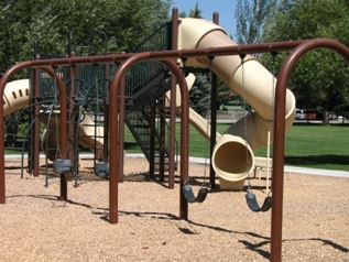Playground at Owen Bircher Park with sand surfacing