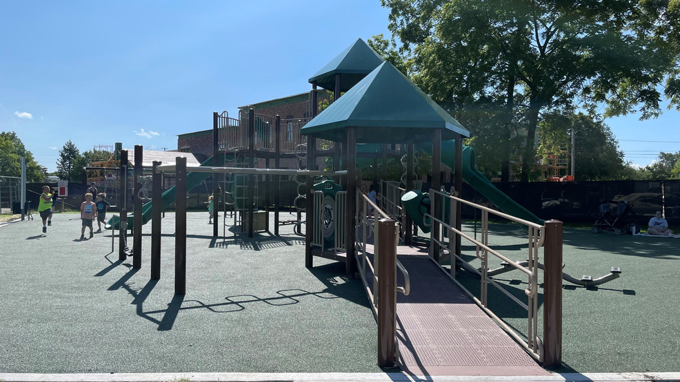 Grand Blanc park play space with accessible surfacing