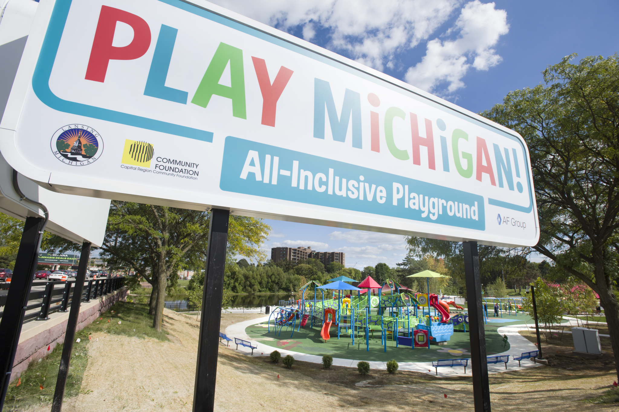 Ribbon-cutting crowd at Play Michigan in Lansing