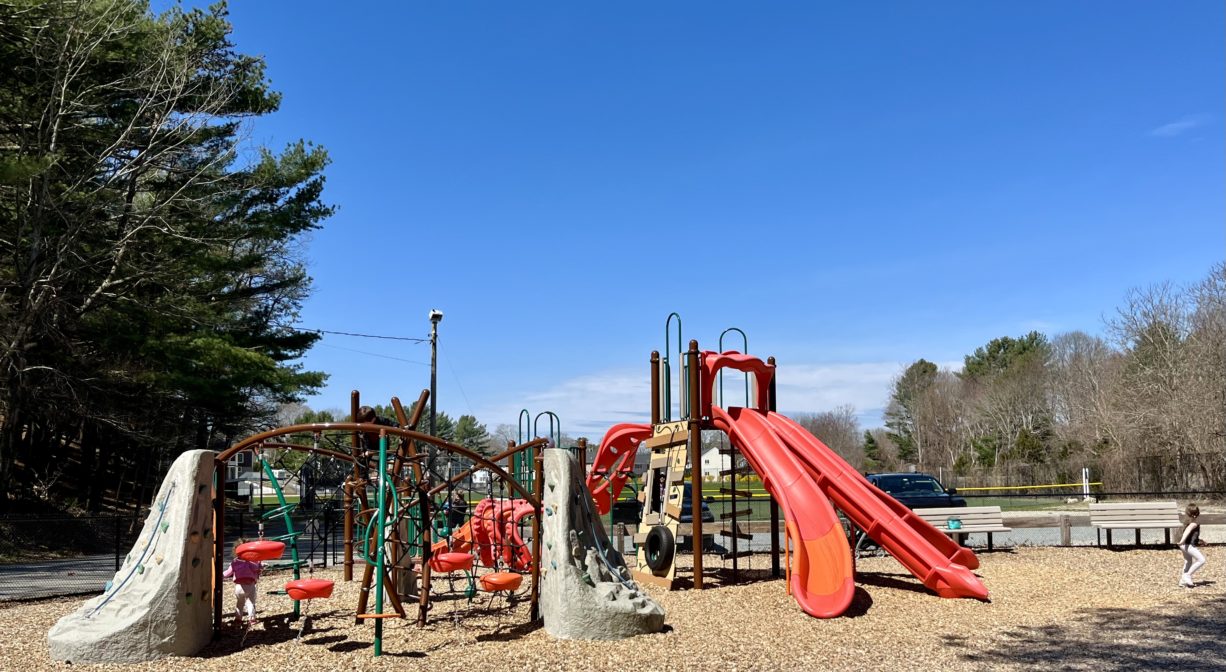 Main red and gray play structure at Right Field Playground