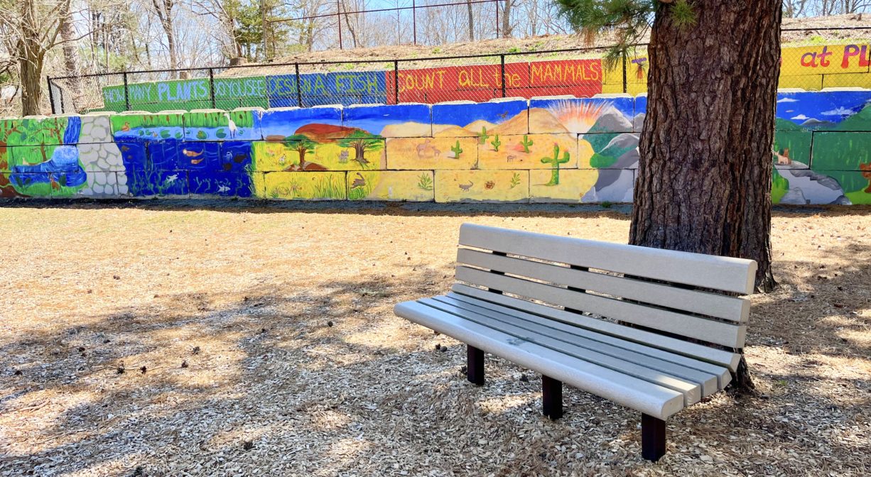 Bench and mural area near Right Field Playground