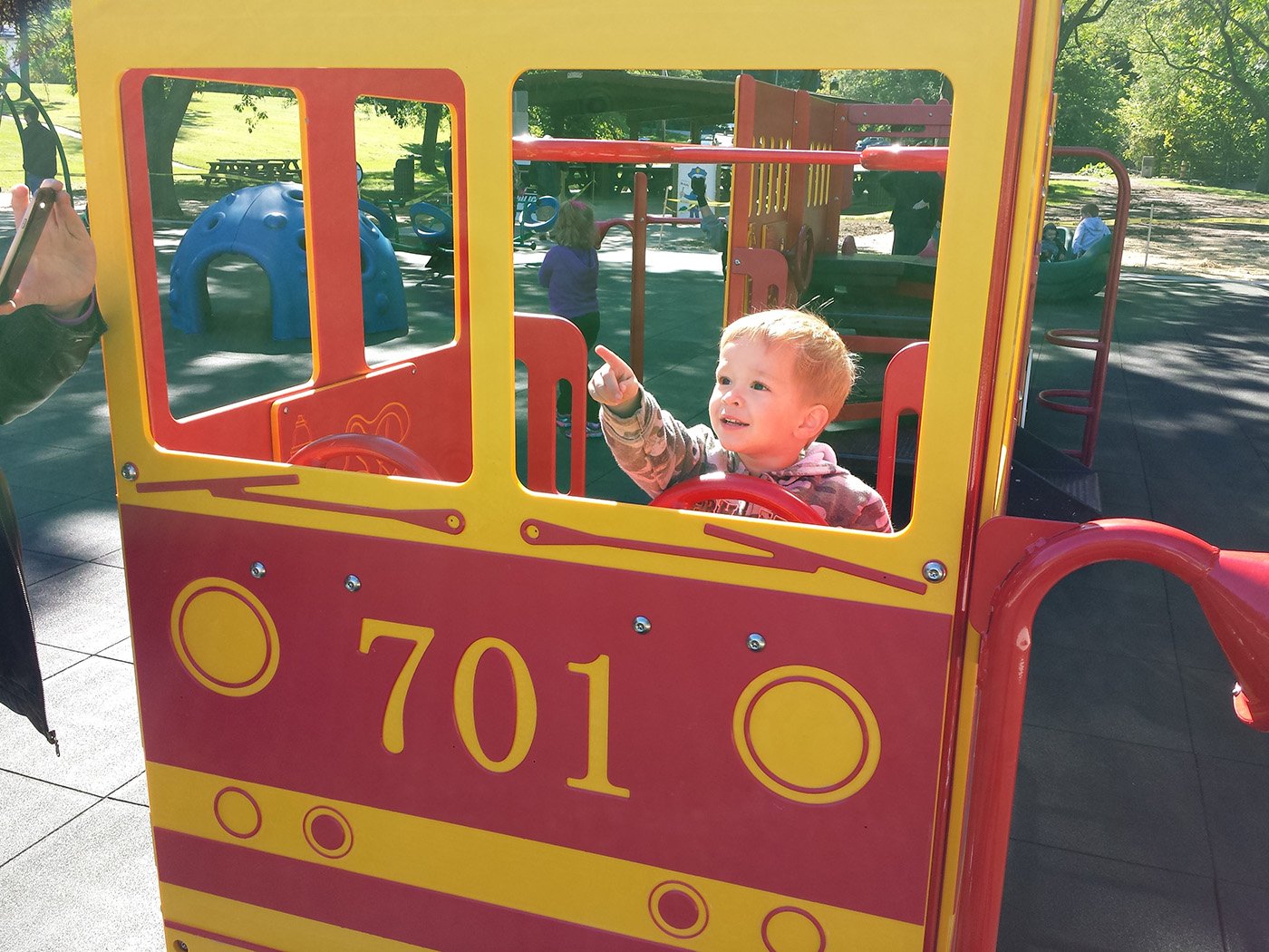 Children playing at Riverside Park inclusive playground