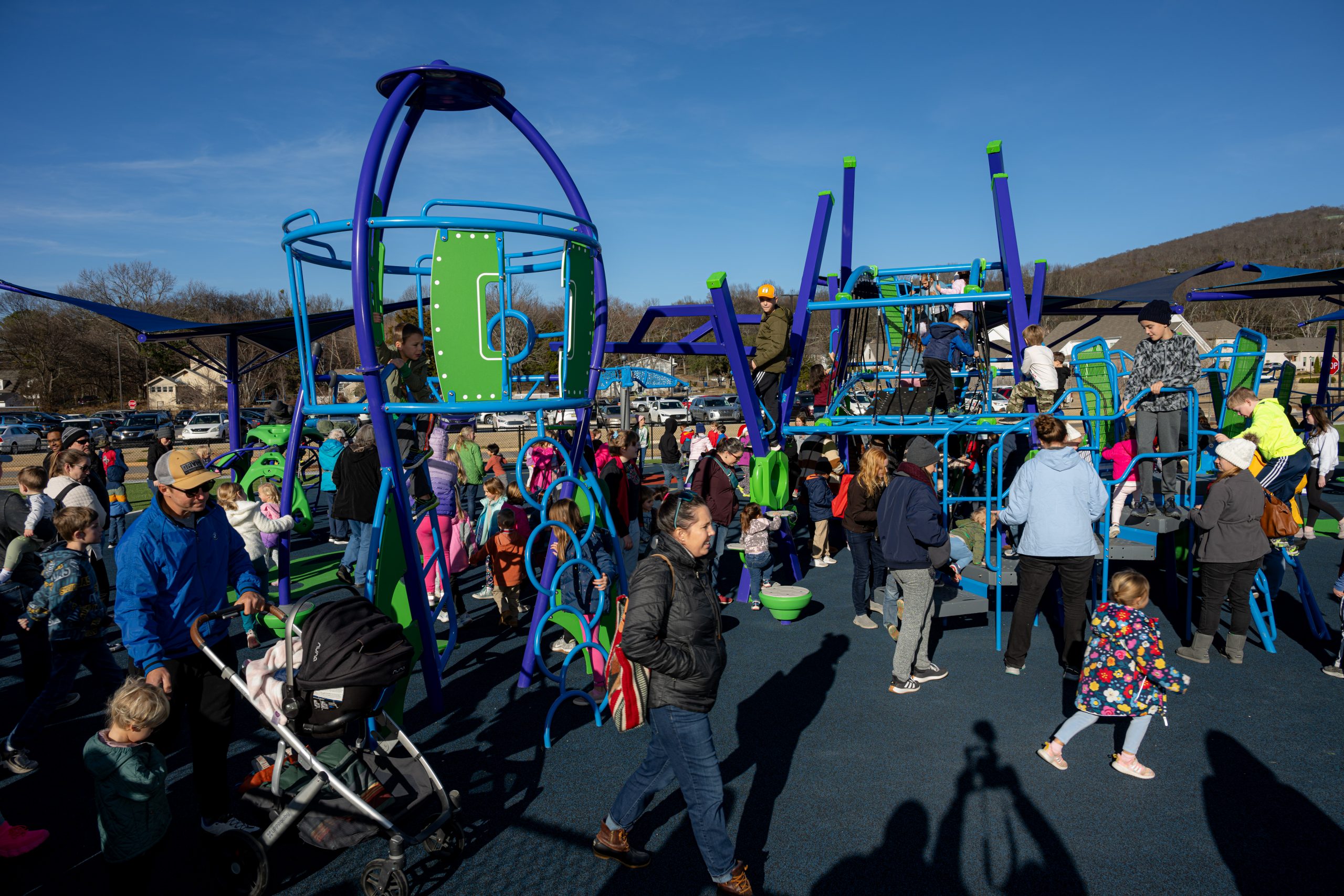 Children playing on the Sandra Moon Community Complex Playground in Huntsville
