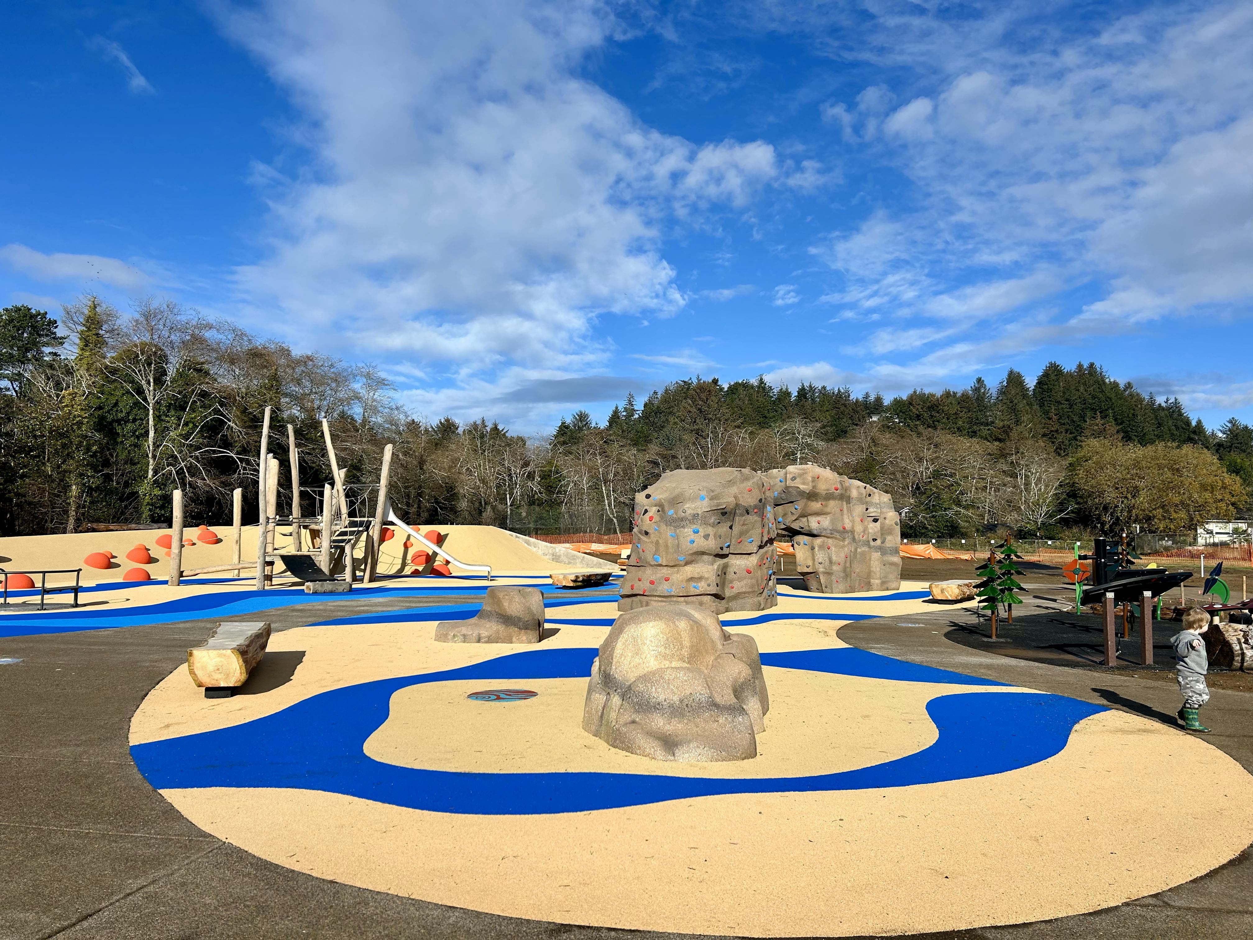 Wide view of the inclusive playground at Schooner Creek Discovery Park in Lincoln City