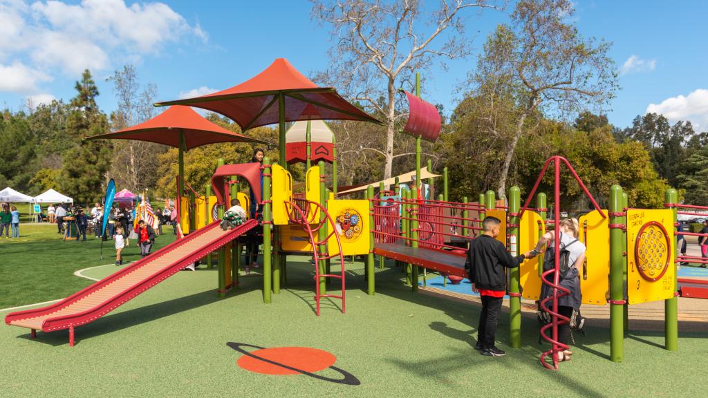 Families using play features at Shane's Inspiration