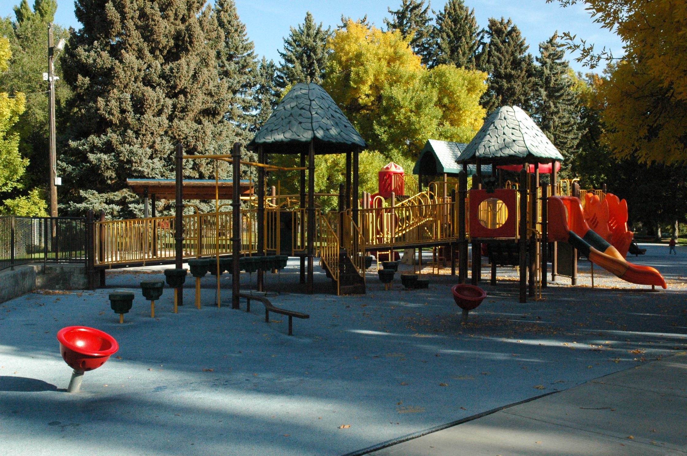 Play area and park setting at Tautphaus Park in Idaho Falls