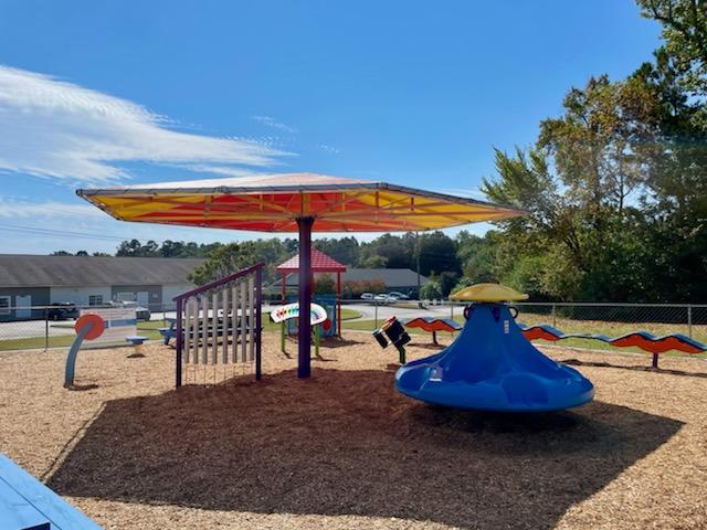 Outdoor inclusive playground at The Mosaic Center