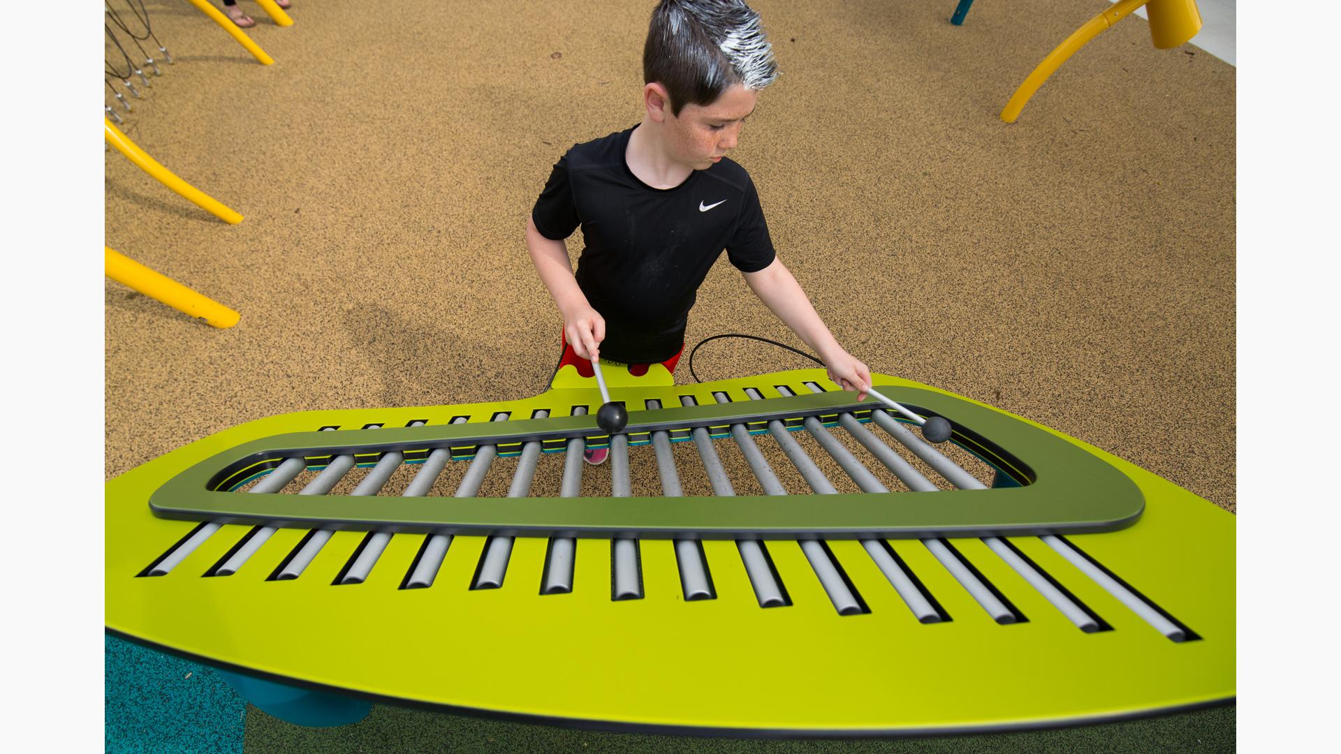 Accessible play structure with ramps at Town Common Inclusive Playground