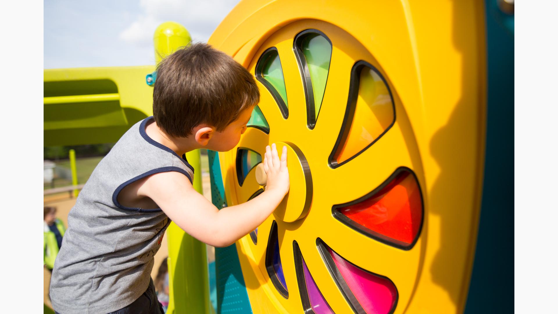 Inclusive playground activity area at Town Common