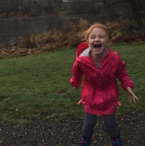 Children using play equipment at Tumwater Historical Park Playground