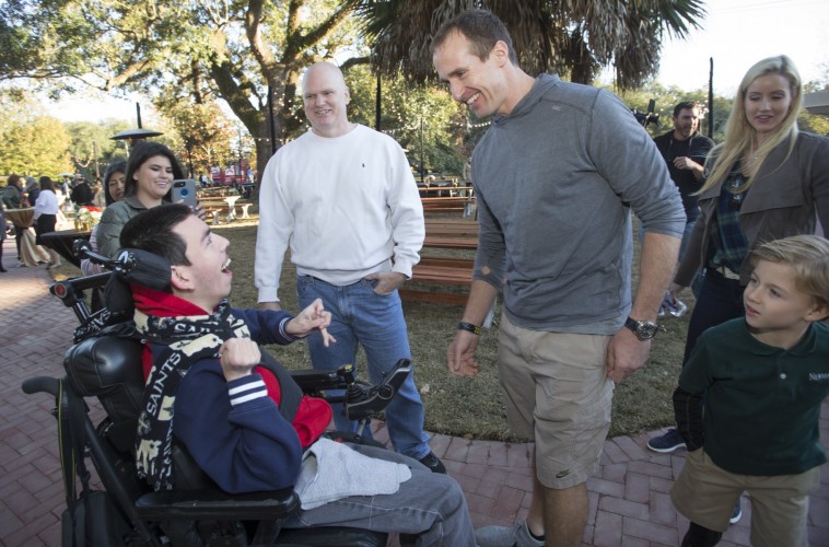 Children using inclusive equipment at Walnut Street Playground
