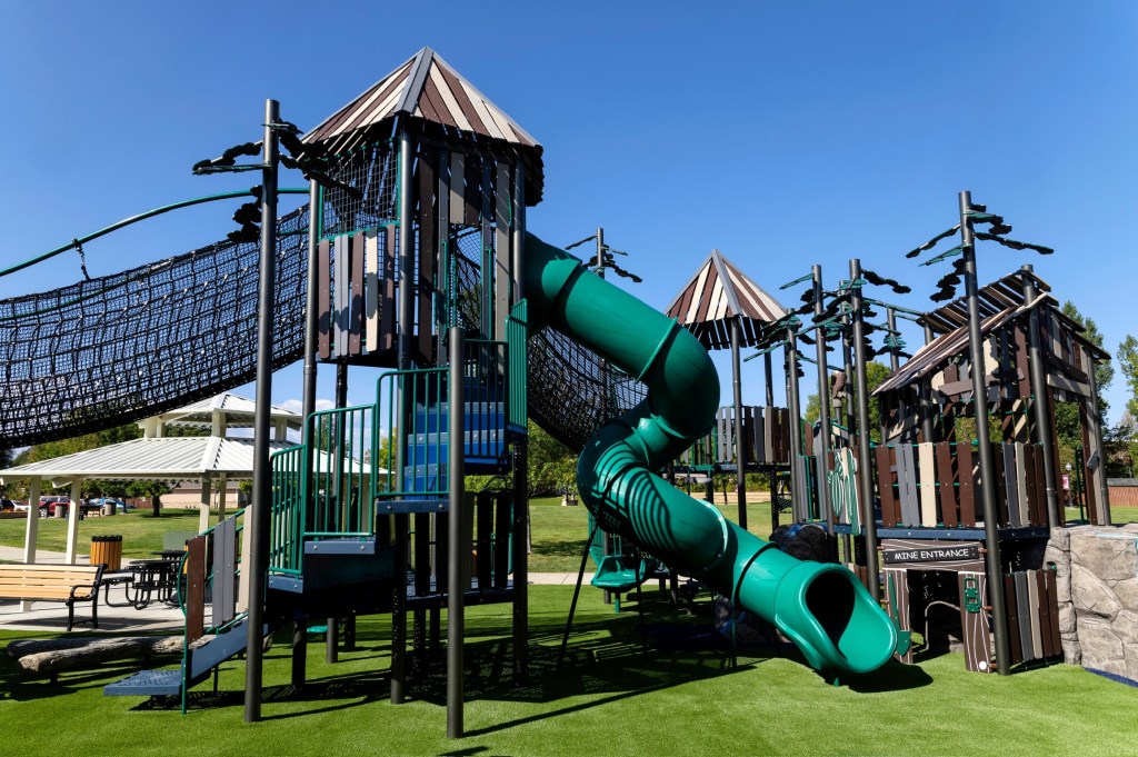 Inclusive playground scene at Whitney Commons in Sheridan