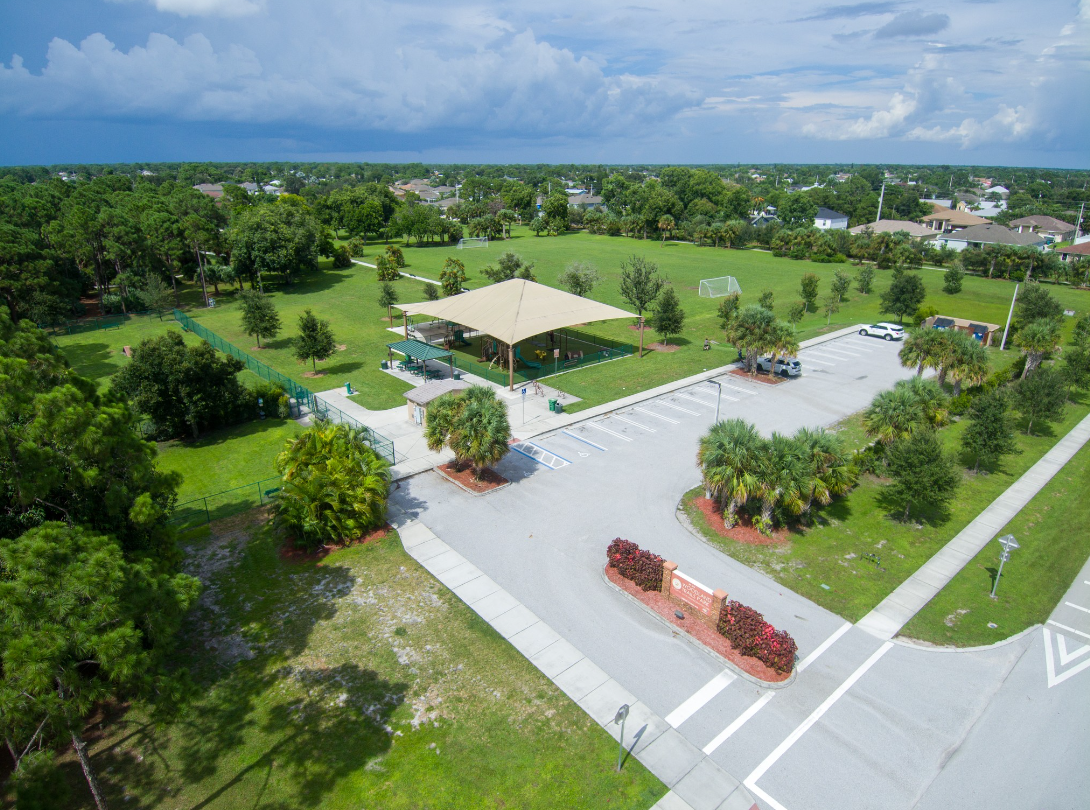 Aerial view of Woodland Trails Park playground and fitness area