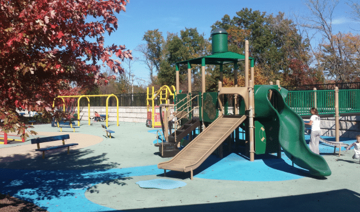 Inclusive play features and surfacing at Zachary's Playground