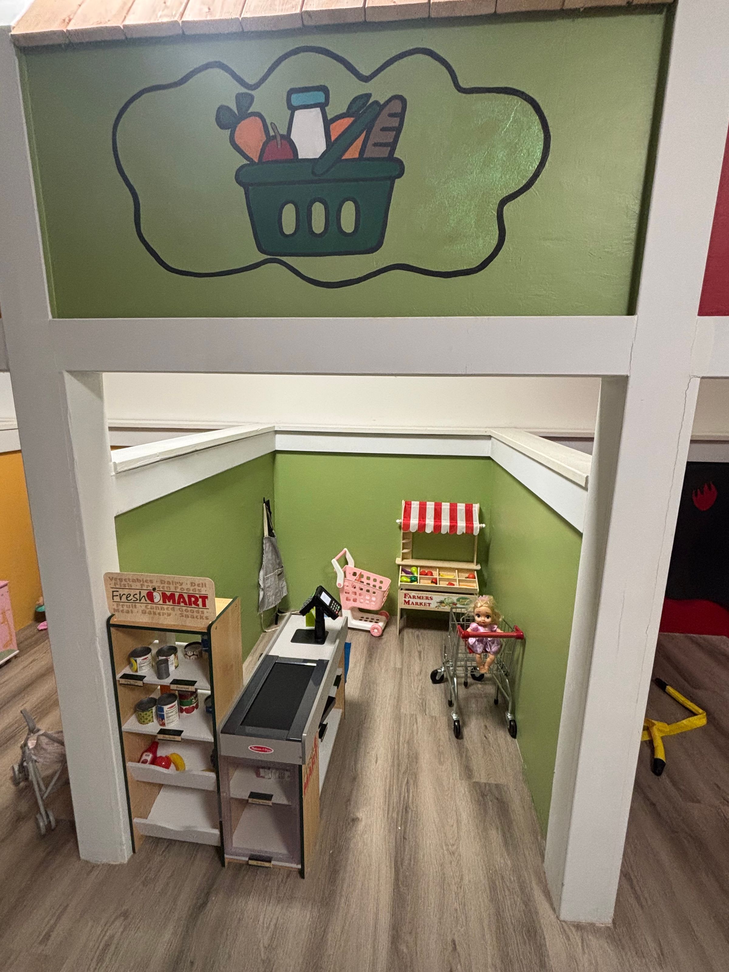 Pretend-play market nook at Adventure Alley