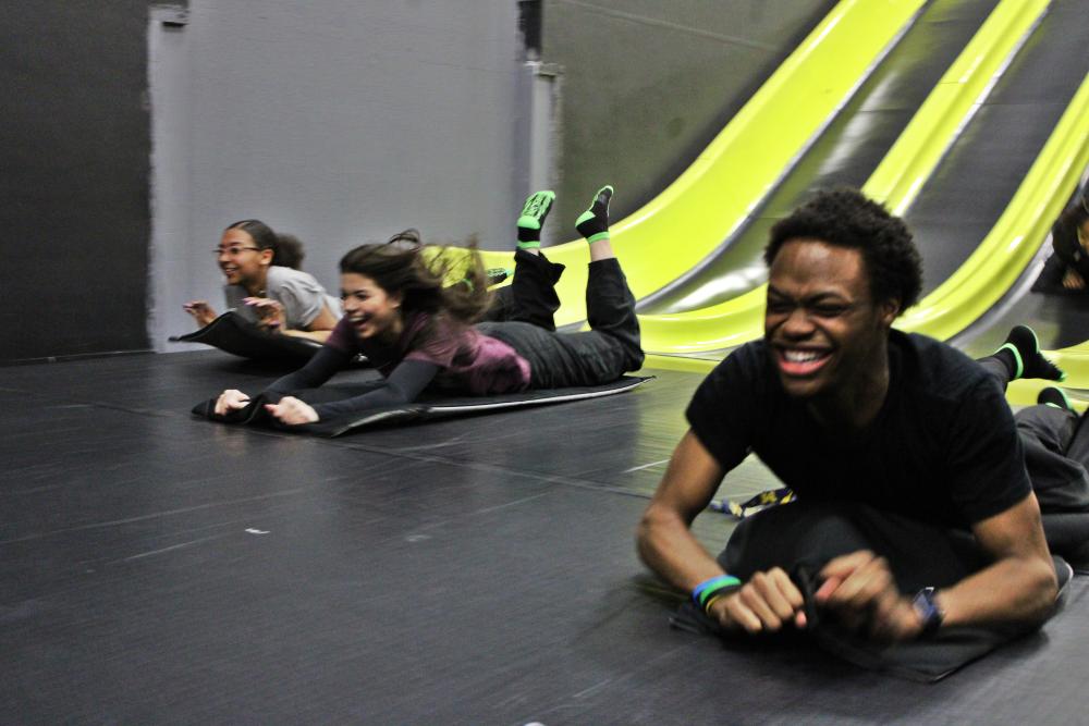 Guests racing down the multi-lane slide at Airborne Adventure Saginaw