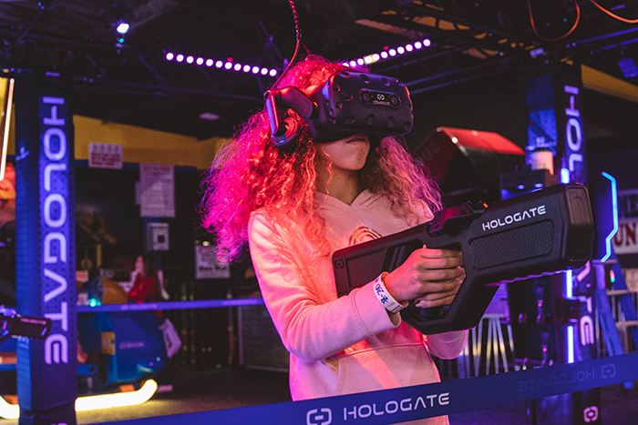 Kids using the Hologate VR attraction at All American Fun Park