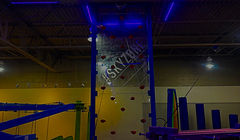 Glow-in-the-dark climbing wall at Astro Fun World