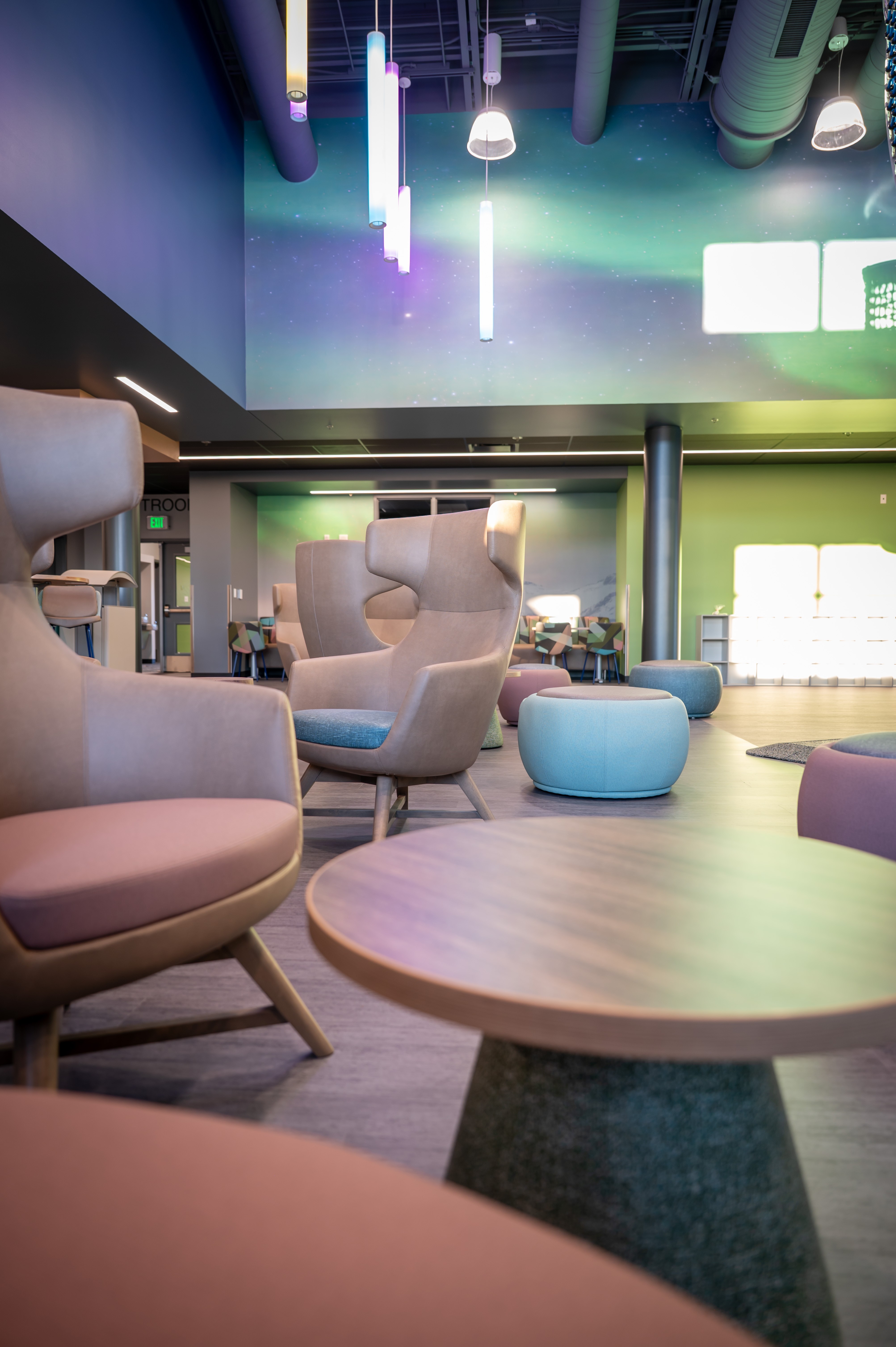 Seating area inside the Aurora Community Activity Center indoor playground.