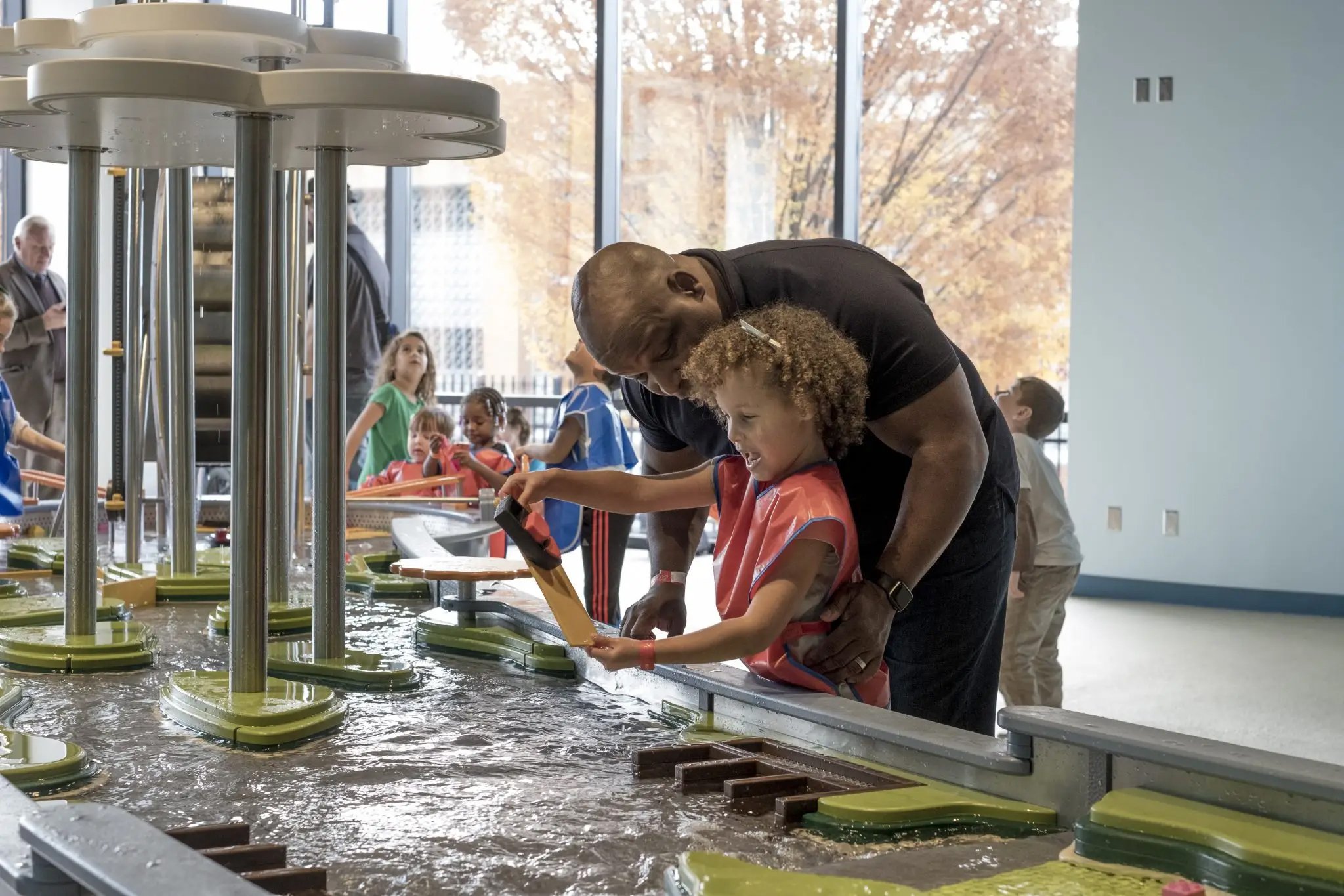 Children playing in a hands-on exhibit area at the Avampato Discovery Museum.